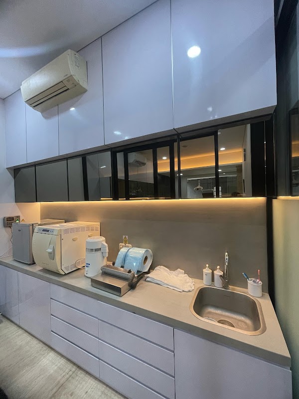 Sterilization area at Dr Teeth Dental Clinic with autoclaves and clean countertop equipment
